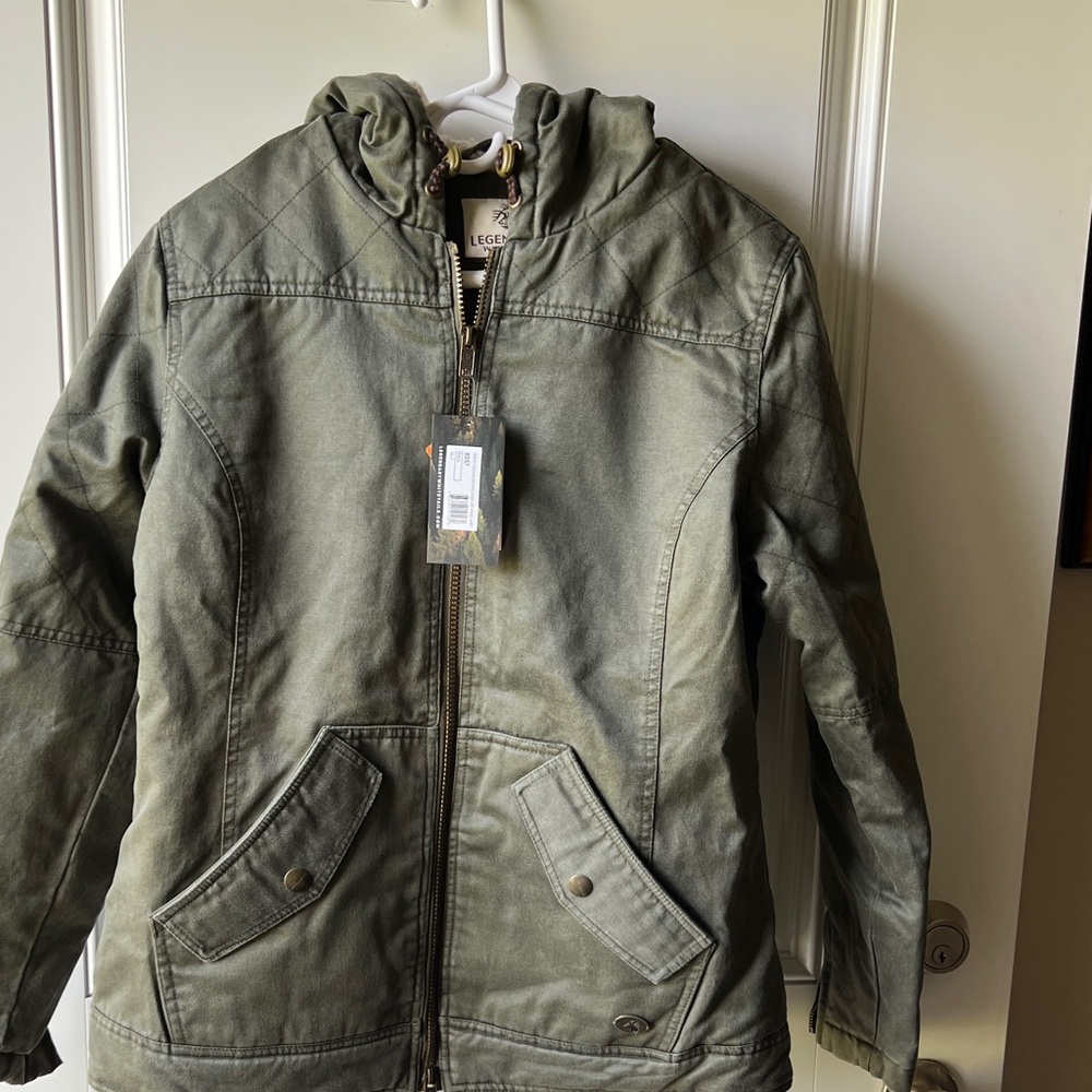 Legendary Whitetails Olive Leaf Women’s Open Range Berber lined Hooded Jacket.